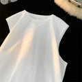 Men's loose solid colour cotton tank top on hanger showing straight hem design