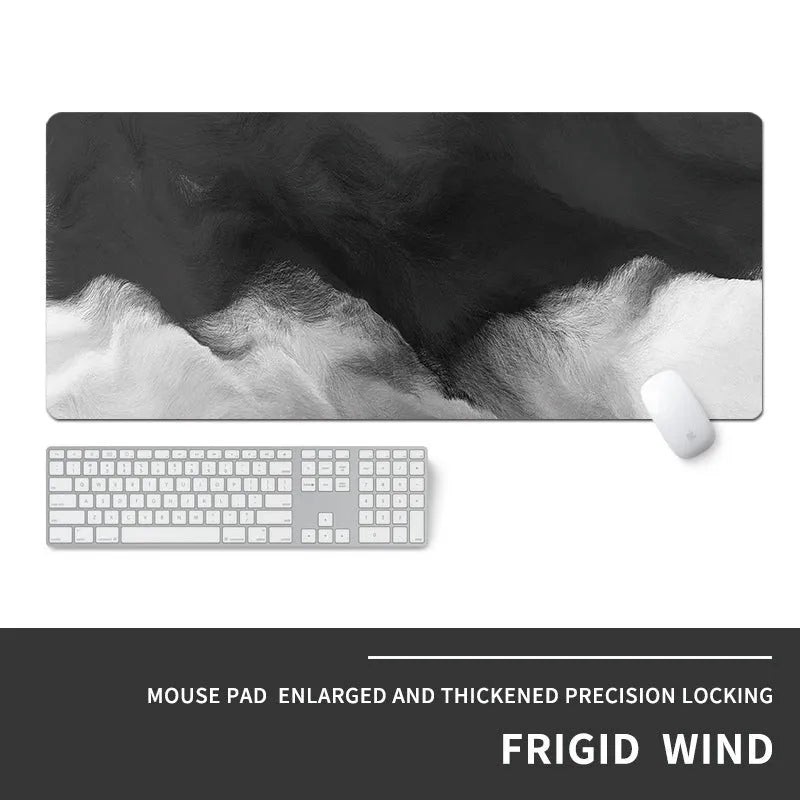 Oversized natural rubber gaming desk mat with graphical print, showing keyboard and mouse placement.