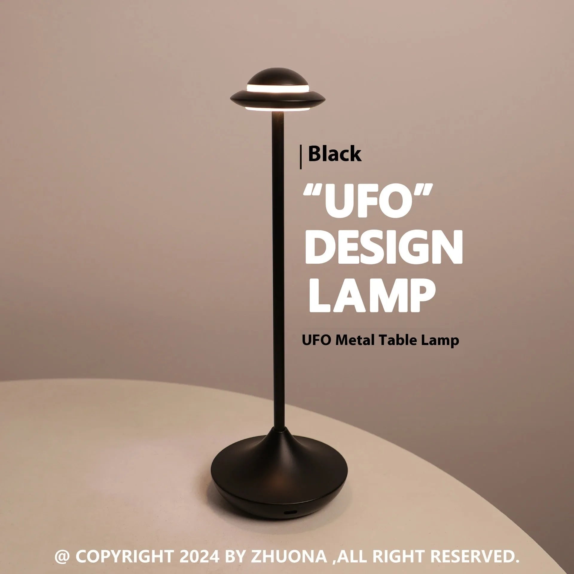 Gold UFO-shaped rechargeable table lamp with touch dimming controls on metallic surface