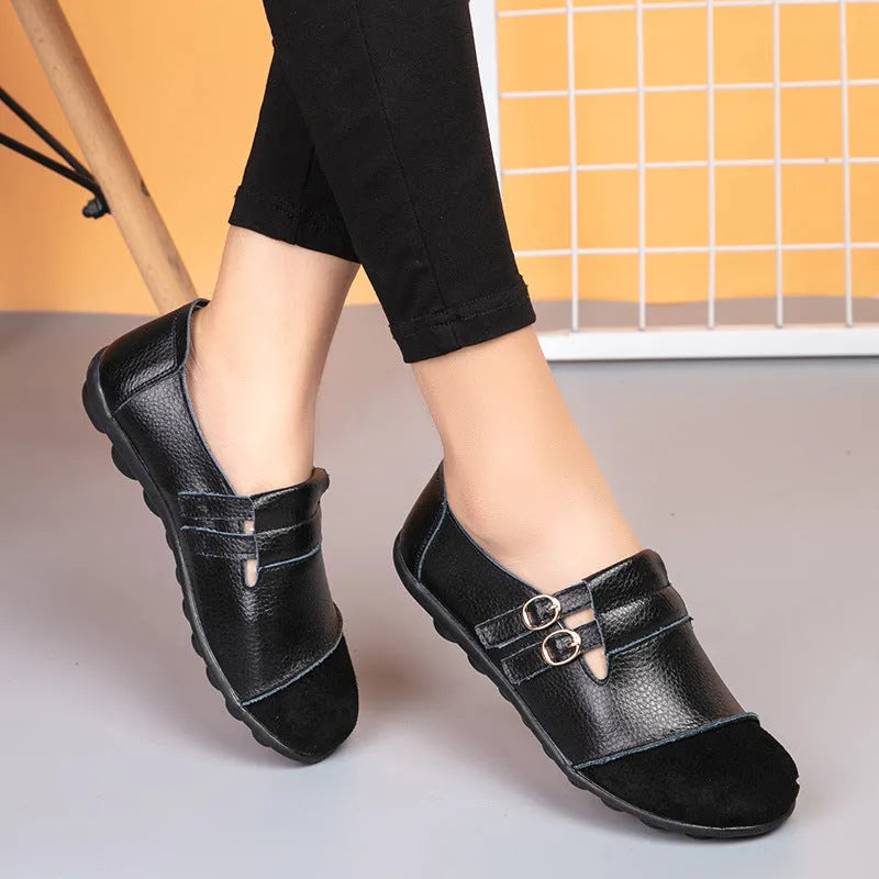 Men's brown leather casual flat shoes with Velcro strap, shown on a white background.