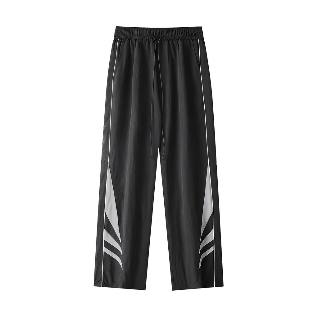 Black straight-leg loose-fit trousers on a plus-size male model for summer casual wear.