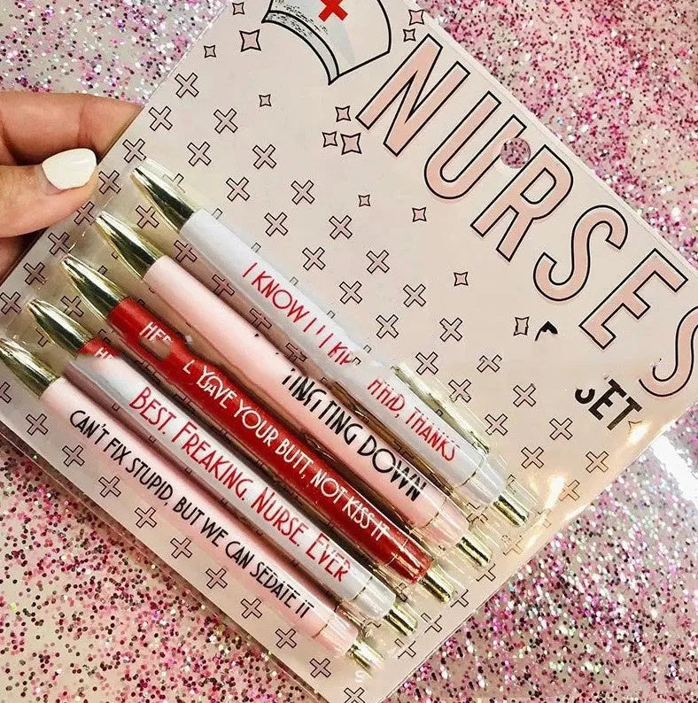 Five nurse-themed ballpoint pens with humorous medical copywriting on plastic barrels