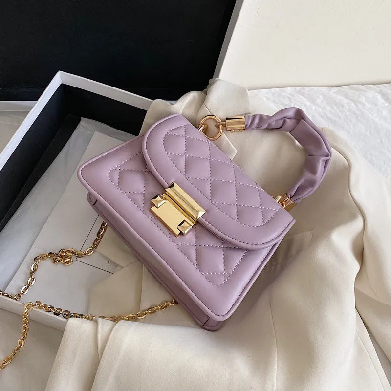 PU women's messenger bag with rhombus square design and crossbody strap in purple colour