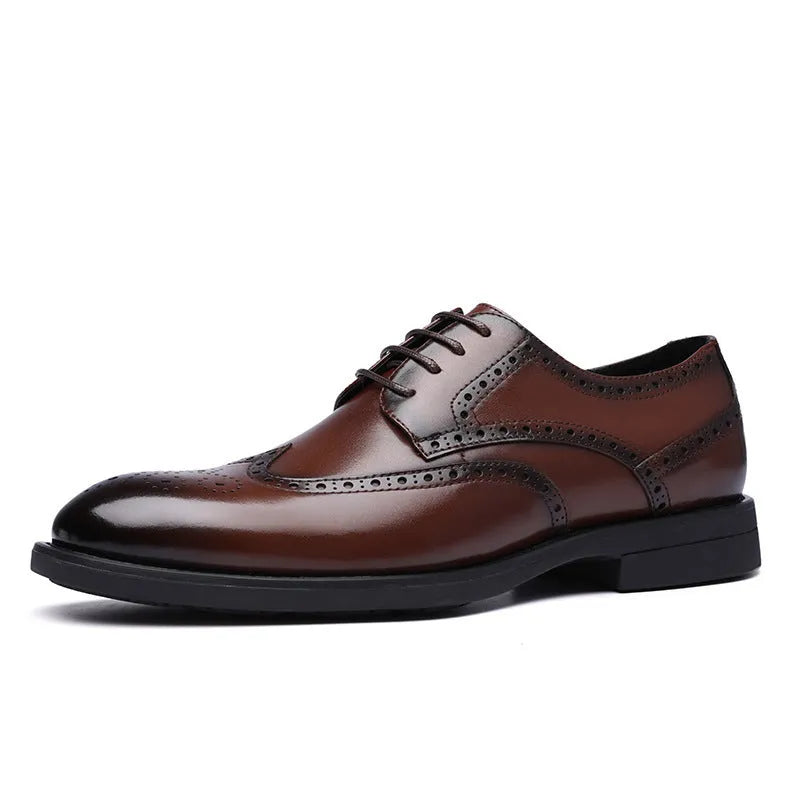 Men's classic black and brown brogue leather shoes with wingtip design on a white background.