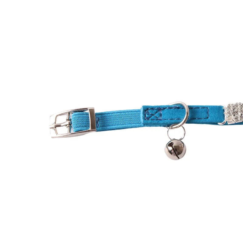 Soft flocking fabric cat collar with elastic buckle and gang drill in multiple colours.