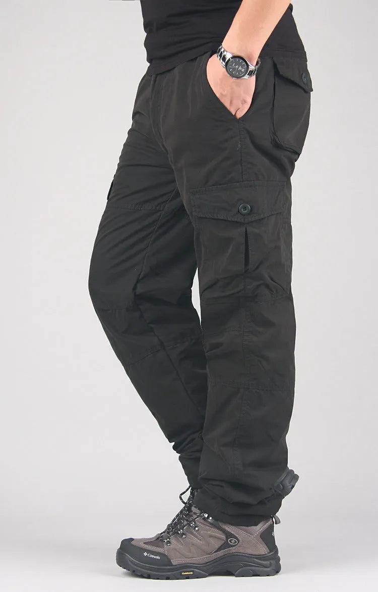 Men's loose-fit cotton velvet overalls with wool lining, shown in khaki colour.