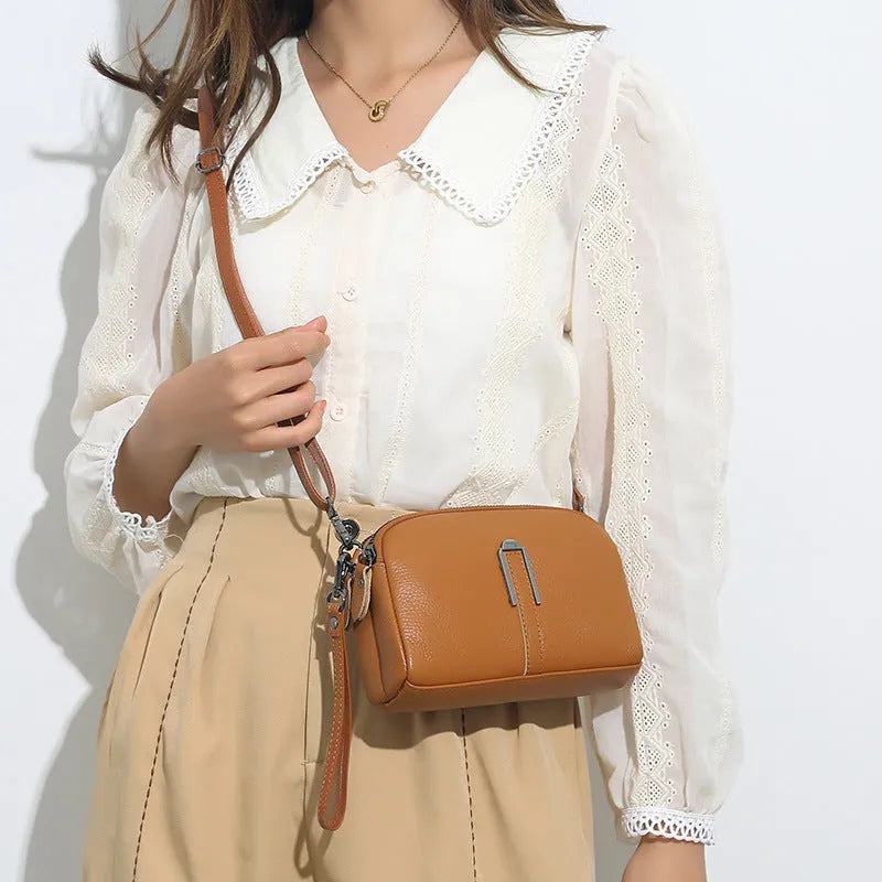 Women's genuine leather shoulder bag in square design with dimensions 19cm by 13cm by 6cm