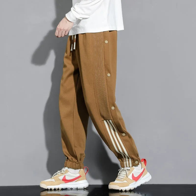 Men's loose ankle-tied autumn sweatpants in cotton blend fabric with high waist design