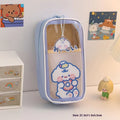 Transparent PVC pencil case with cartoon pattern, showing large capacity design for stationery storage