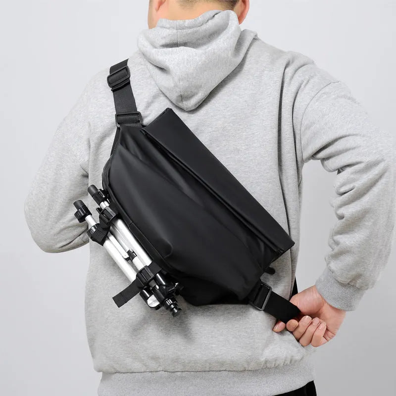 Grey PU leather men's crossbody bag showing internal phone and document compartments