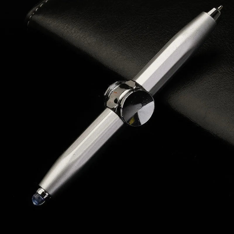 Metal ballpoint pen with integrated fingertip spinner and LED lights, shown in hand
