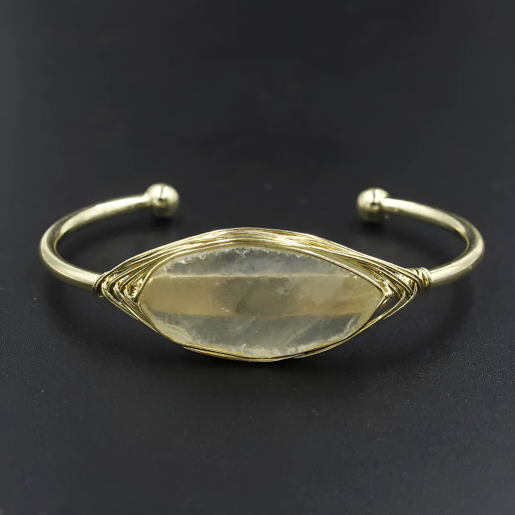 Natural raw gemstone bracelet with 8mm amorphous crystal beads on an adjustable open band.