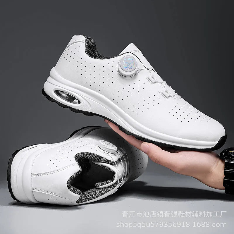 Black and white low-top mesh casual shoes with cross shoulder straps and a composite sole.