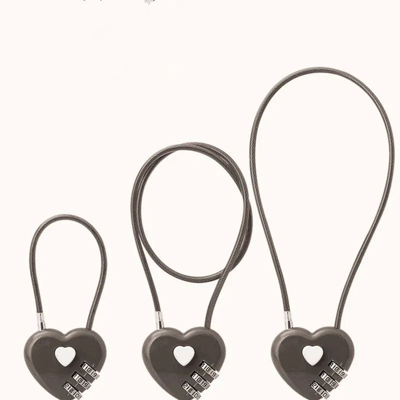 Peach heart shaped ABS plastic lock with a steel wire rope, shown in a choice of colours.