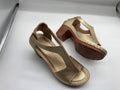 Women's white peep toe wedge sandals with Roman style buckle and low heel