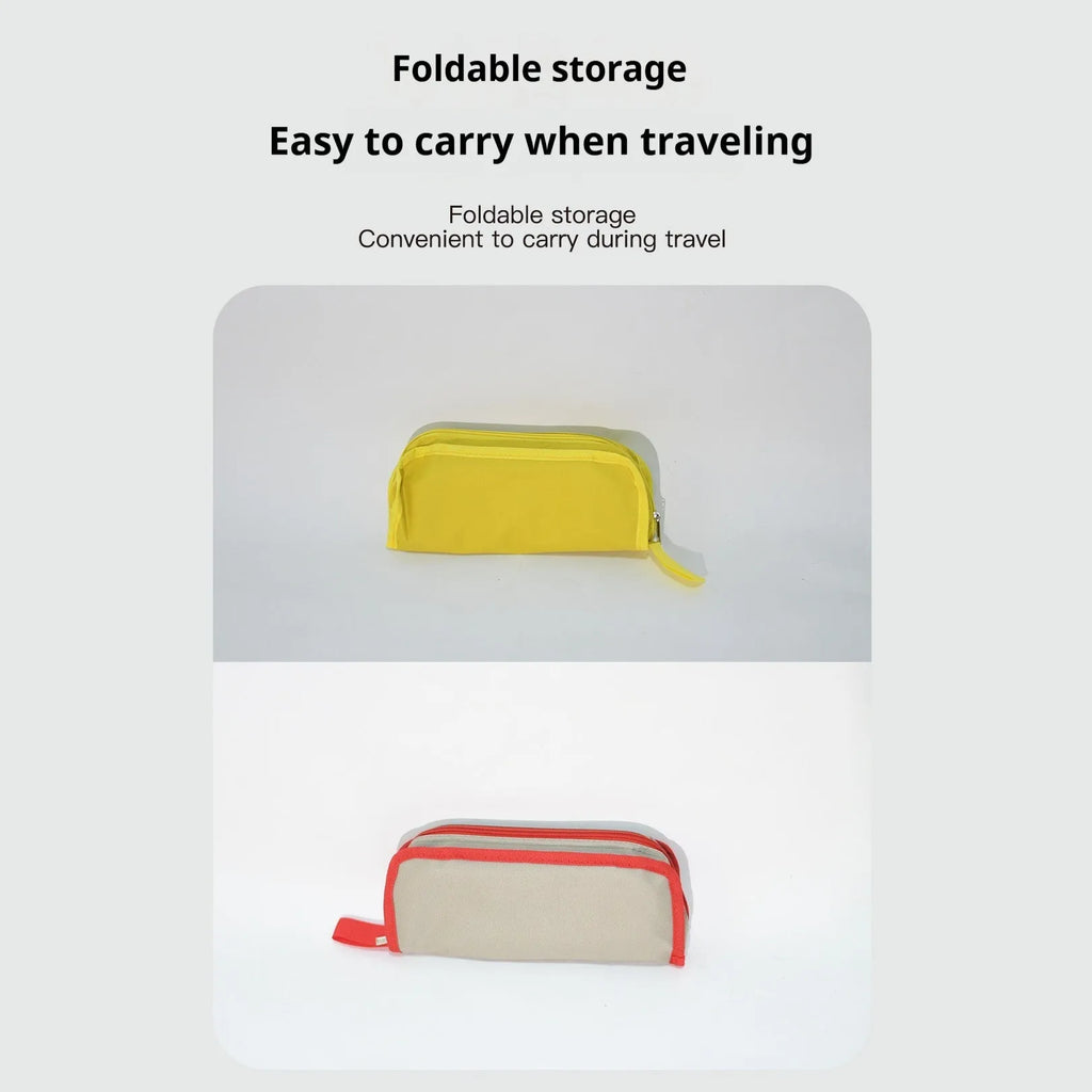 Foldable outdoor camp stool in Oxford cloth shown in a khaki colour, collapsed in its flat pencil box design.