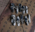 Heavy industry night blue press-on nails with ornate rose and tulip patterns in four sizes XS to L