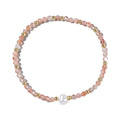 A geometric natural stone bracelet with an ellipse detail, shown in one of fifteen available colour options.