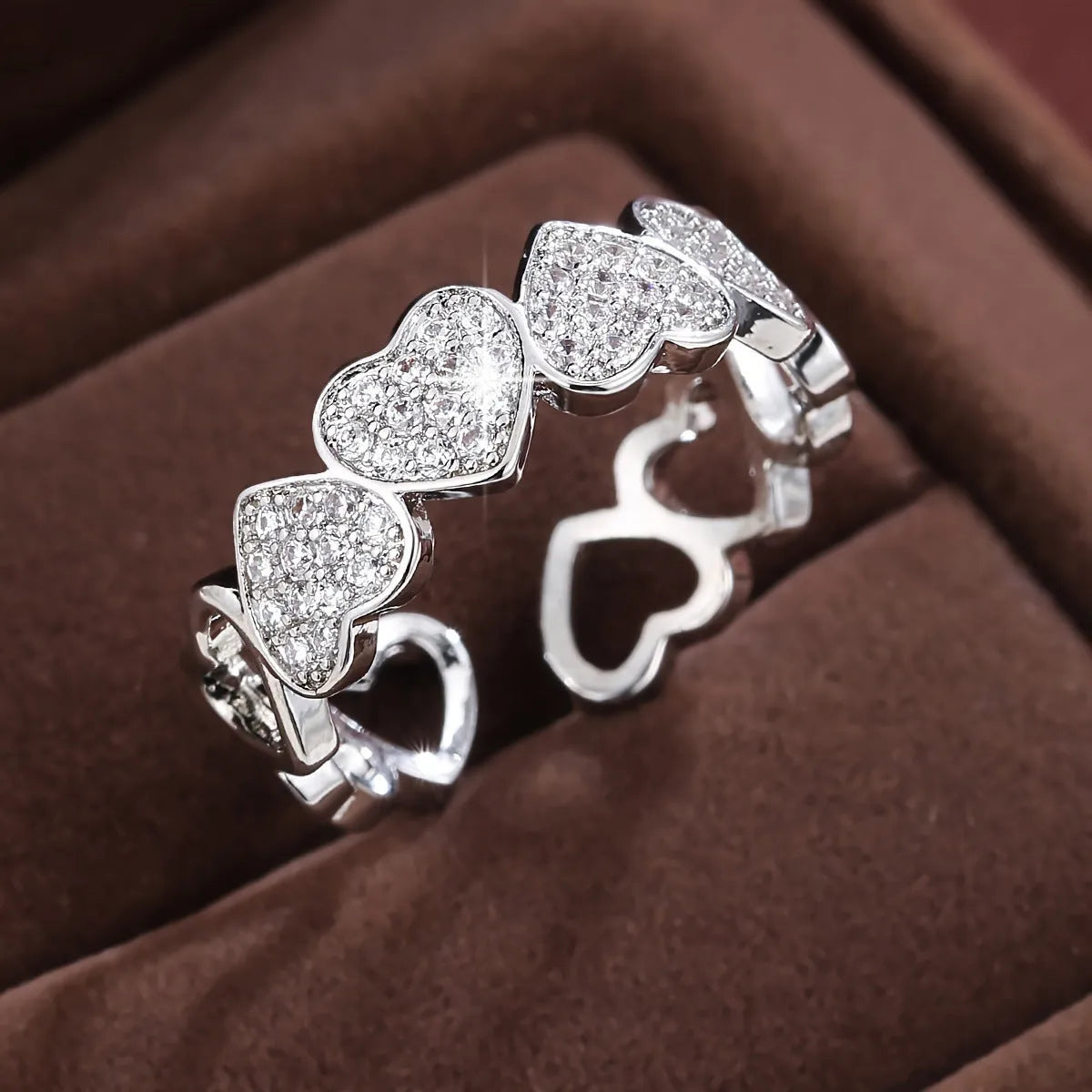 Adjustable open-ended copper couple's ring with geometric shape and heart detailing in gold or silver finish
