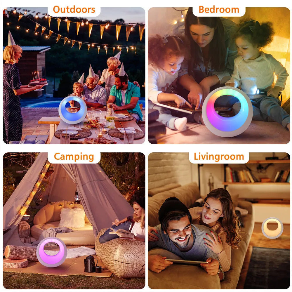 Small RGB colour changing night lamp with remote control on bedside table