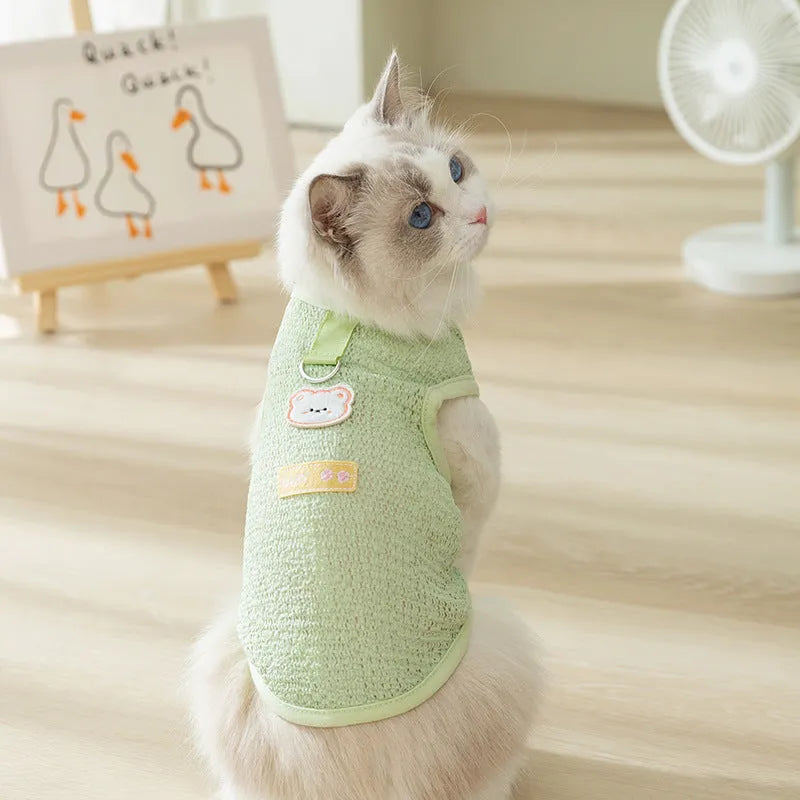 Breathable knitted cat clothing with a hollowed-out cartoon bear patch in blue