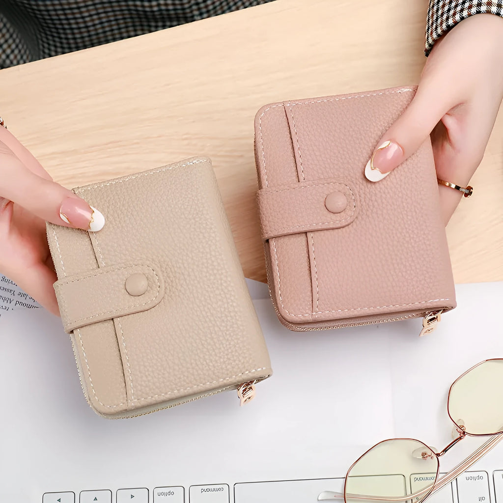 Women's lychee pattern short wallet in beige, pink, black, or red colours with decorative sewing thread detail.