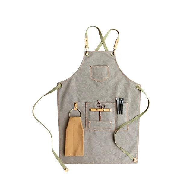 Canvas apron with cross back straps in camel colour for cafe and baking workwear
