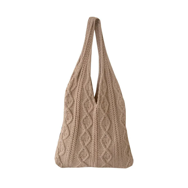 Knitted wool yarn shoulder tote bag with hollow crochet design in solid colour