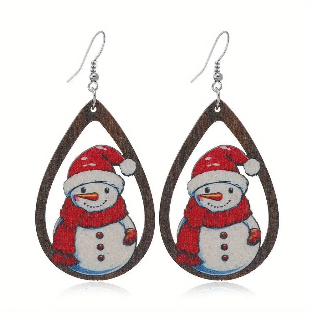 Wooden Christmas earrings with printed tree and snowman designs in geometric shapes