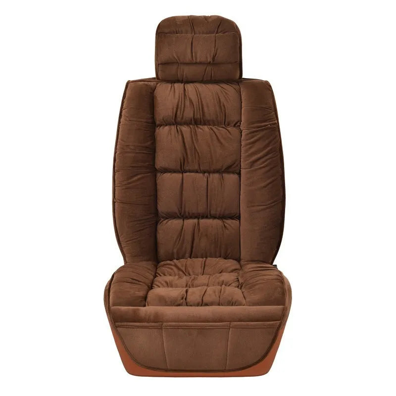 Short plush car seat cushion in charcoal grey on vehicle seat