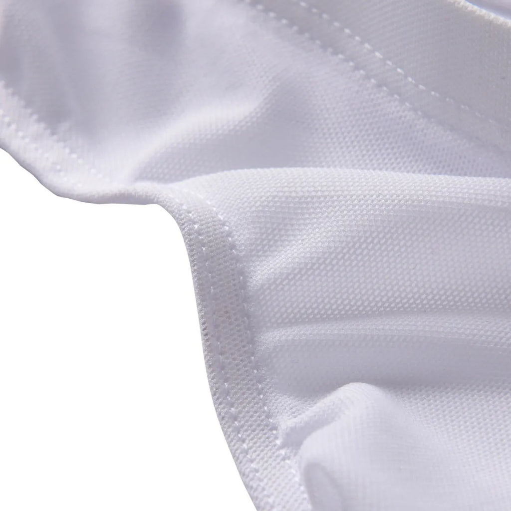 Men's black triangle mid waist nylon shorts laid flat, showing low waist briefs style.