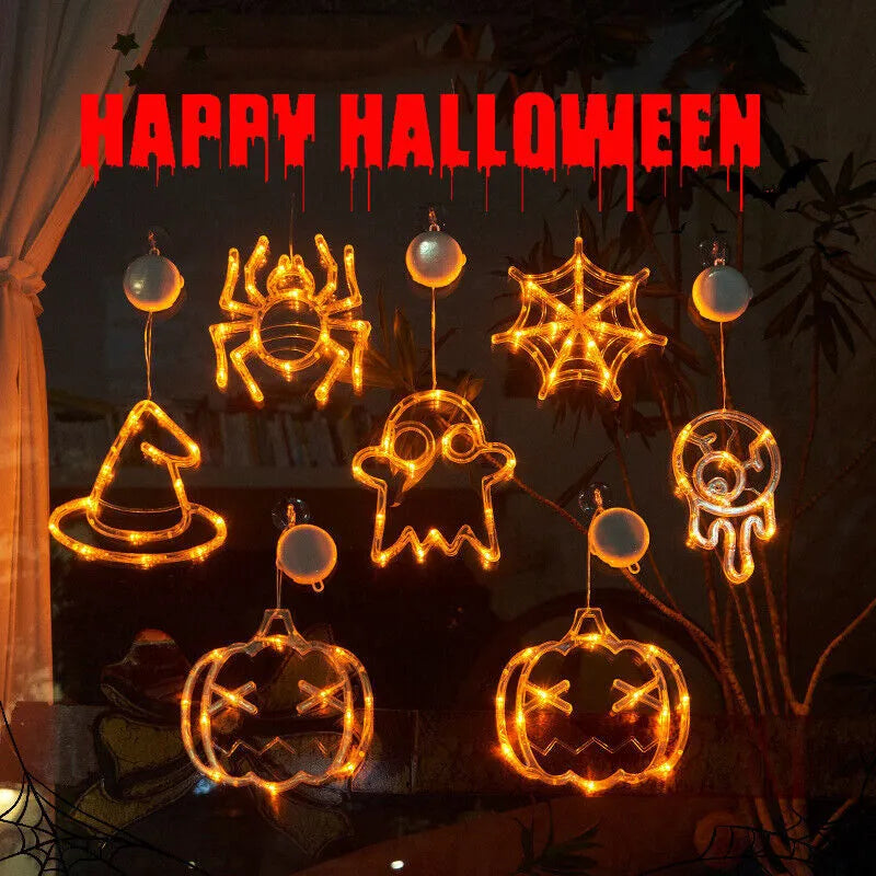 Seven Halloween LED lights with suction cups featuring spider, pumpkin and ghost designs for window decoration