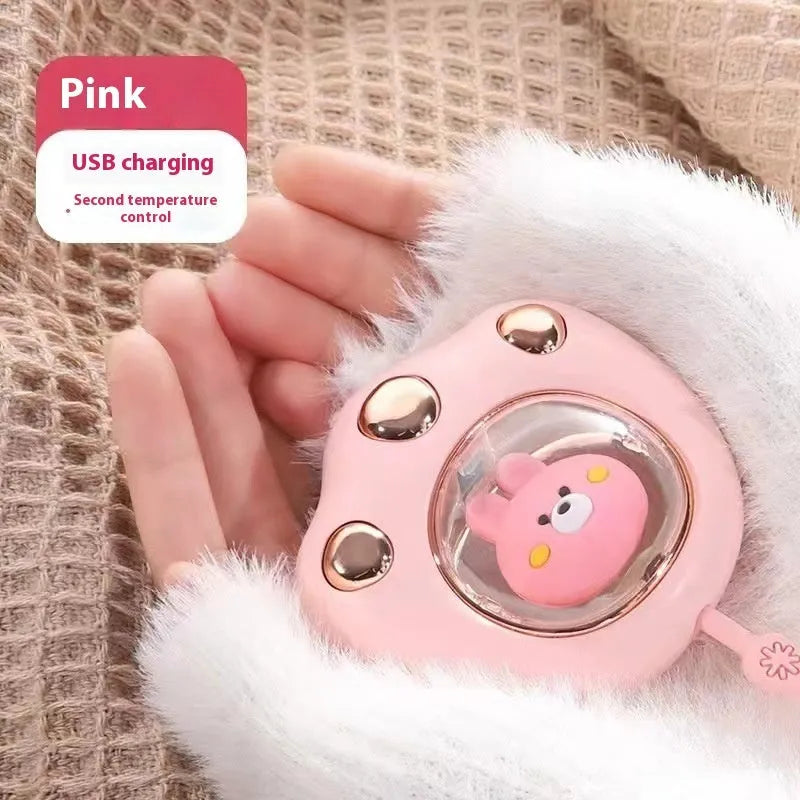 USB digital display hand warmer in pink, showing aluminium heating pad and screen