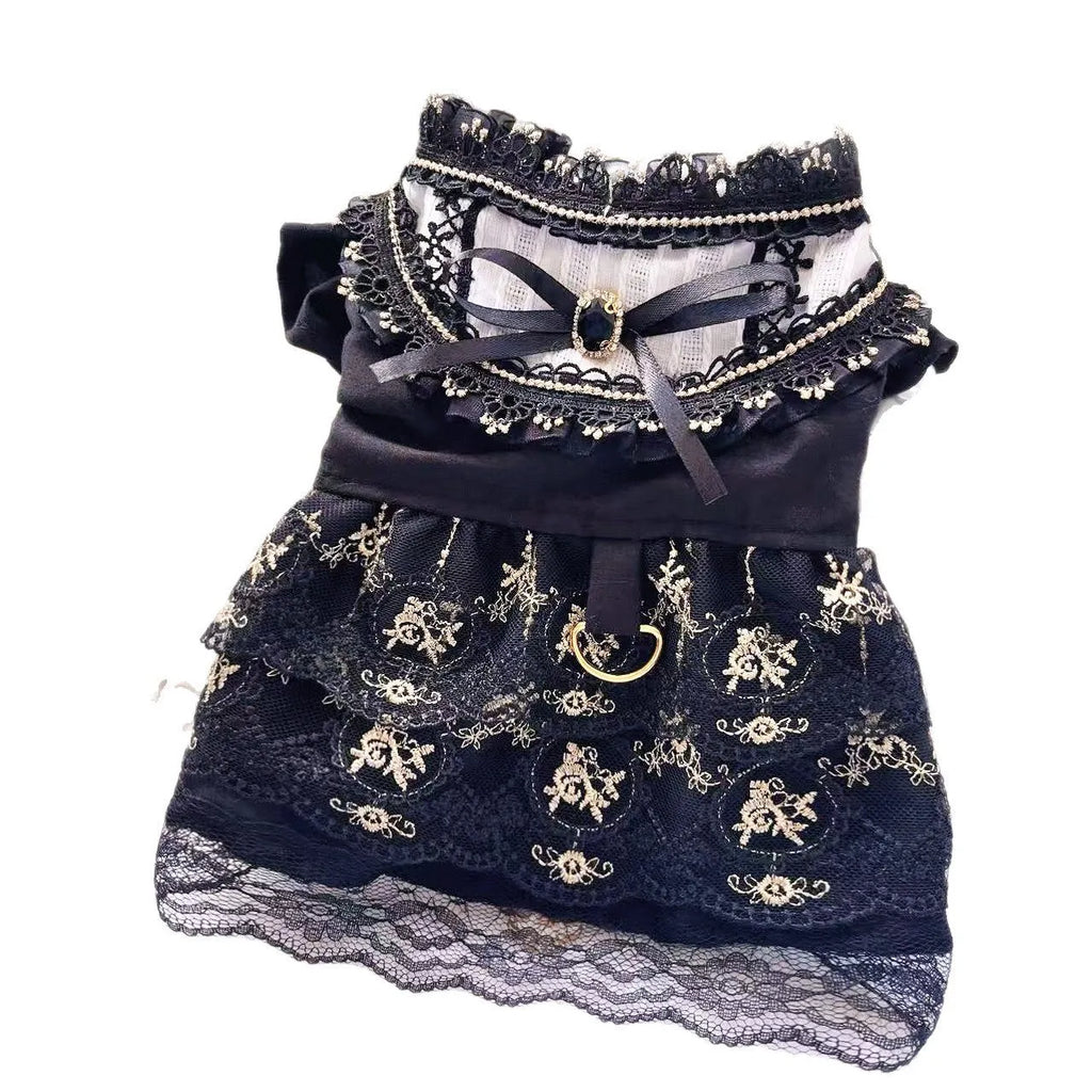 Golden Gothic princess skirt costume for a small dog on a mannequin.
