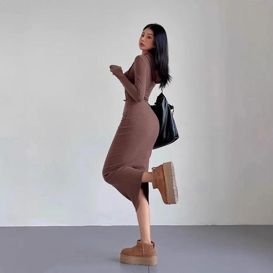 Women's grey polyester sheath dress with long sleeves and a high waist, knee-length.
