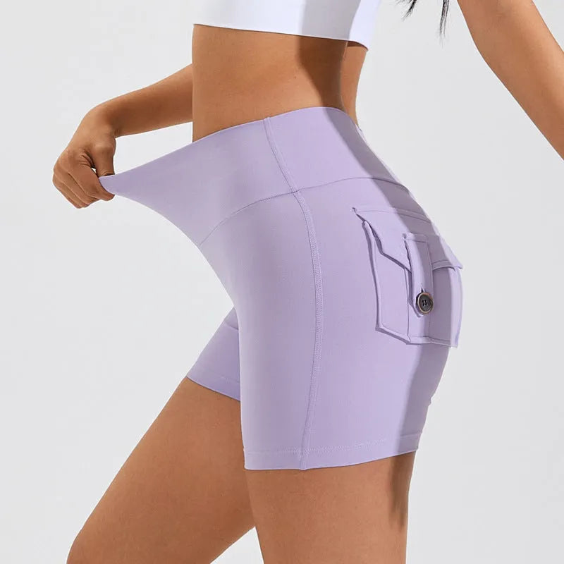 Women's high waist fitness shorts with pockets in avocado green colour for yoga and workouts
