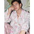 Long sleeve floral shirt with three-dimensional embossed pattern in loose fitting blue version
