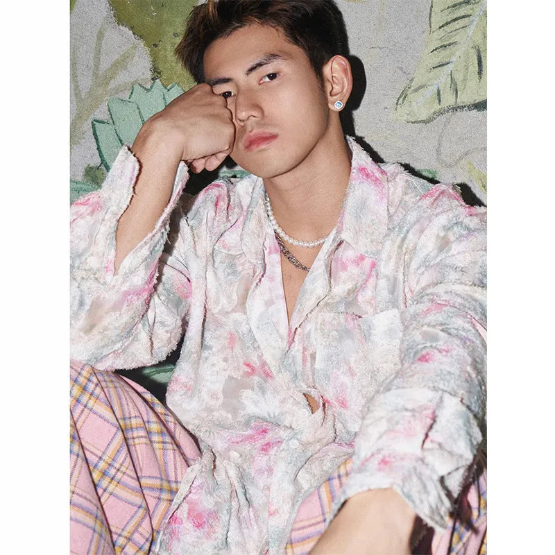 Long sleeve floral shirt with three-dimensional embossed pattern in loose fitting blue version