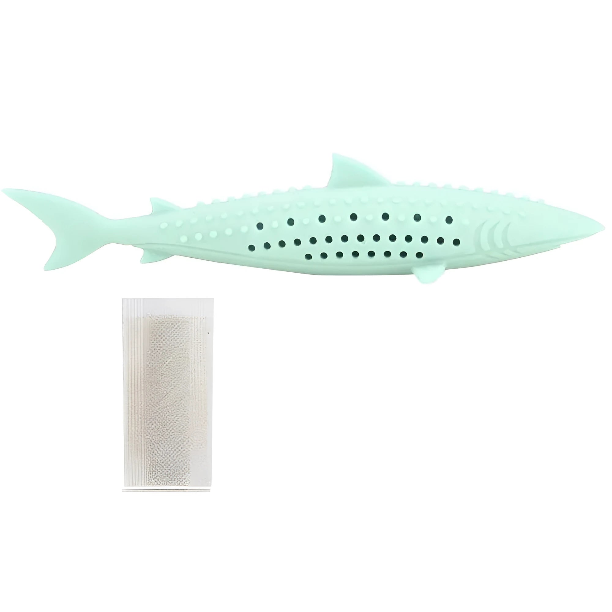 Green silicone fish-shaped cat chew toy with breathable side holes on wooden floor