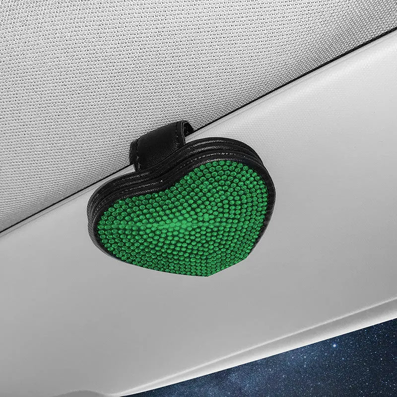 Diamond-encrusted PU leather magnetic clip for car sun visor, holding sunglasses and a card.