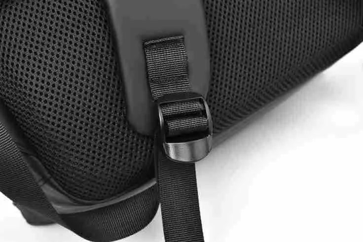 Men's large waterproof PU backpack in black, blue, or grey showing sewing thread details