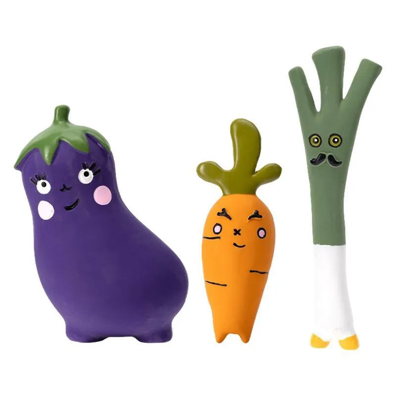 Cartoon onion and eggplant latex dog chew toy for puppies on a white background.