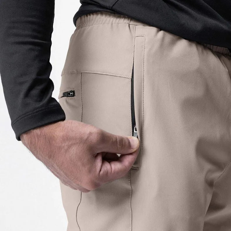 Men's loose grey quick-dry fitness trousers with ankle-tied cuffs for running and gym workouts