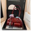 Women's retro pillow-shaped PU leather shoulder bag with flap closure and double straps