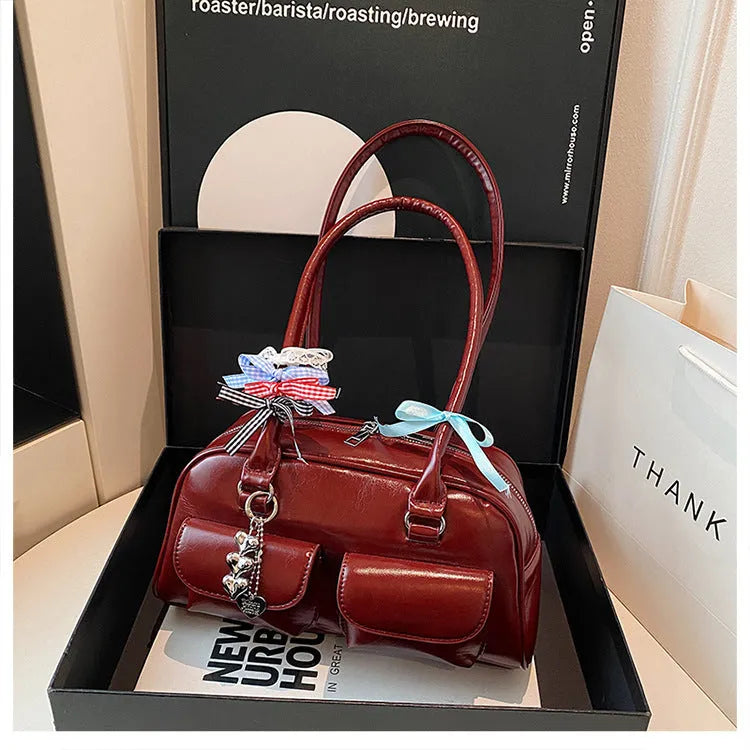 Women's retro pillow-shaped PU leather shoulder bag with flap closure and double straps