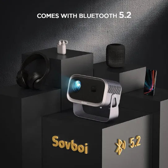 White 4K smart home theatre projector displaying content on wall with mobile phone compatibility shown