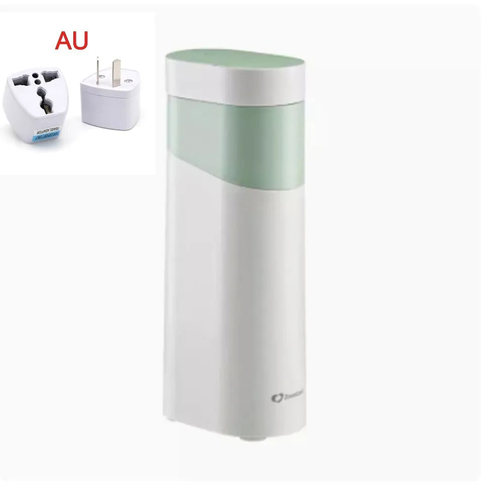 Black or green small instant water dispenser with digital display on a desktop.