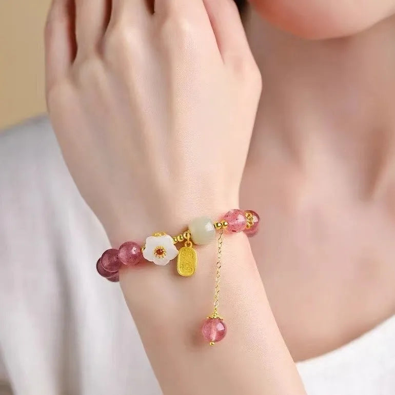 Handcrafted strawberry quartz crystal bracelet for women with natural style and multiple charm options