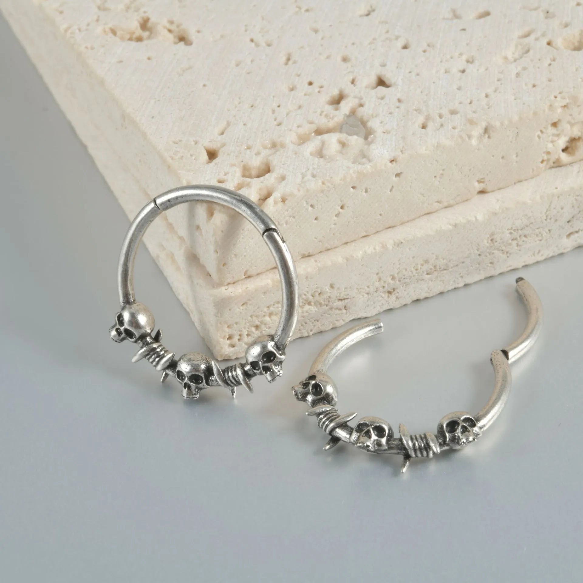Copper punk earrings with ghost head designs in antique silver or ancient gold finishes