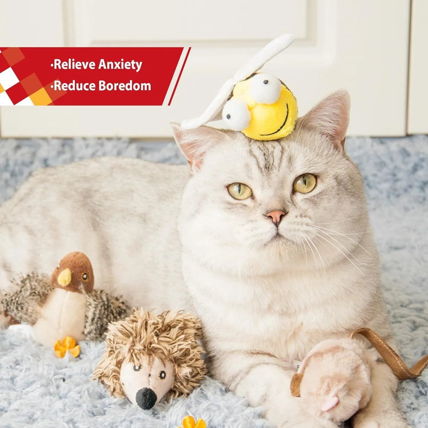Yellow flannelette bee-shaped electronic cat toy on a plain background.